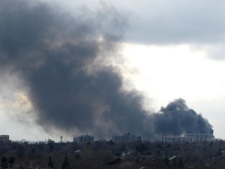 Smoke can be seen billowing in the sky from a transformer fire in Toronto on Friday March 18, 2011. (THE CANADIAN PRESS/ Alan Black)