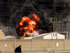 Flames and smoke are seen at the scene of a fire at a Hydro One transformer station Friday, March 18, 2011. (Photo courtesy of Don Cahigas)