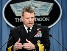 Navy Vice Adm. Bill Gortney, director of the Joint Staff, gives an operational update concerning Libya, at the Pentagon in Washington, Sunday, March 20, 2011. (AP Photo/Cliff Owen)