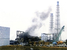 In this photo released by Tokyo Electric Power Co. (TEPCO) via Kyodo News, gray smoke rises from Unit 3 of the tsunami-stricken Fukushima Dai-ichi nuclear power plant in Okumamachi, Fukushima Prefecture, Japan, Monday, March 21, 2011. Official says TEPCO temporarily evacuated its workers from the site. (AP Photo/Tokyo Electric Power Co. via Kyodo News)