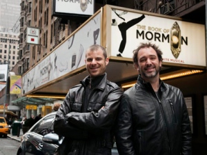 Trey Parker, right, and Matt Stone, co-creators of the Broadway show "The Book of Mormon," pose outside the Eugene O'Neill Theatre in New York City on March 16, 2011. (AP photo/Victoria Will)