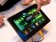 When Research In Motion's PlayBook enters the tablet market, comparisons to Apple's iPad will be inevitable.  (THE CANADIAN PRESS/AP-Isaac Brekken)