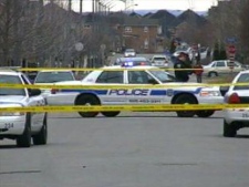Peel Regional Police at the scene of a fatal stabbing on Longford Drive in Mississauga on Tuesday, March 22, 2011.