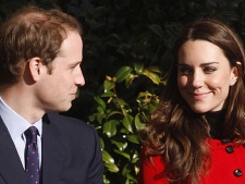 In this Feb. 25, 2011 file photo, Britain's Prince William and his fiancee Kate Middleton exchange glances, during a visit to the University of St. Andrews, in St. Andrews, Scotland, where they first met. (AP Photo/Danny Lawson, pool)