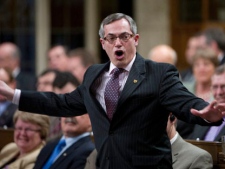 Minister of Industry Tony Clement responds to a question during Question Period in the House of Commons on Parliament Hill in Ottawa on Thursday, March 24, 2011. (THE CANADIAN PRESS/Sean Kilpatrick)