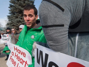 Stuntman and comedian Steve-O joins animal advocates in calling for the release of Lucy, a 35-year-old Asian elephant, outside Edmonton's Valley Zoo in Edmonton, Alta., on Friday, March 11, 2011. (THE CANADIAN PRESS/John Ulan)