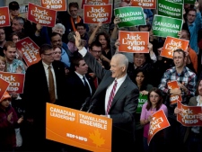 NDP Leader Jack Layton waves to supporters during a campaign rally in Toronto on Wednesday, March 30, 2011. The federal election will be held on May 2. (THE CANADIAN PRESS/Andrew Vaughan)