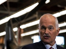 NDP Leader Jack Layton announces plans to assist small business as he visits a wood working plant during a campaign event in Oshawa, Ont. on Wednesday, March 30, 2011. The federal election will be held on May 2. (THE CANADIAN PRESS/Andrew Vaughan)