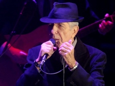 Canadian poet and singer Leonard Cohen performs during a concert in Warsaw, Poland, on Sunday, Oct. 10, 2010. (AP Photo/Alik Keplicz)