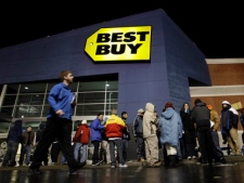Crowds of shoppers line up in the early hours of Friday, Nov. 26, 2010, at a Best Buy store in Tacoma, Wash. (AP Photo/Ted S. Warren)