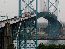 Vehicles cross the Ambassador Bridge as viewed from Windsor, Ont., Monday, June 1, 2009. (THE CANADIAN PRESS/ Dave Chidley)