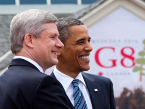 Prime Minister Stephen Harper greets United States President Barack Obama during the official welcoming of the G-8 leaders to the G8 Summit in Huntsville, Ont., on Friday June 25, 2010. (THE CANADIAN PRESS/Sean Kilpatrick)