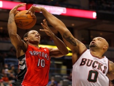 Toronto Raptors' DeMar DeRozan(10) has his shot blocked by Milwaukee Bucks' Drew Gooden (0) in the first half of an NBA basketball game against the Milwaukee Bucks Monday, April, 11, 2011, in Milwaukee. (AP Photo/Jeffrey Phelps)