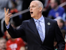 Toronto Raptors coach Jay Triano calling out a play in the second half of an NBA basketball game, Friday, April 8, 2011, in Philadelphia. (AP Photo/Michael Perez)