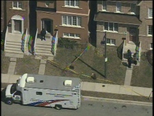 Police on the scene at 27 Aldwinckle Hts. The body of a 23-year-old woman was discovered in a basement apartment Friday morning. 