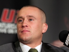 UFC 129 fighter Mark Hominick listens to a question at a news conference in Toronto on Tuesday February 8, 2011. (THE CANADIAN PRESS/Frank Gunn)