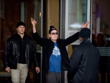 Charlie Sheen greets his fans outside the Ritz Carlton Hotel before walking through downtown Toronto on the way to the second night of his Violent Torpedo of Truth tour at Massey Hall in Toronto in hopes of raising donations for O.B.A.D. The Organization for Bipolar Affective Disorders through CanadaHelps.org on Friday, April 15, 2011. (THE CANADIAN PRESS/Aaron Vincent Elkaim)