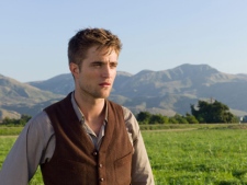 In this publicity image released by Twentieth Century Fox, Robert Pattinson is shown in a scene from "Water for Elephants." (AP Photo/Twentieth Century Fox, David James)
