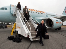 NDP Leader Jack Layton arrives in Ottawa as he heads to a campaign rally at Ecole secondaire du Versant in Gatineau, Que. on Monday, April 25, 2011. The federal election will be held on May 2. (THE CANADIAN PRESS/Andrew Vaughan)