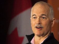 NDP leader Jack Layton talks with reporters during a campaign stop in Saint John, N.B., on Monday, April 25, 2011. The federal election will be held on May 2. (THE CANADIAN PRESS/Andrew Vaughan)