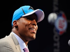 Auburn quarterback Cam Newton responds to questions during a news interview after he was selected as the first pick overall by the Carolina Panthers in the NFL football draft at Radio City Music Hall on Thursday, April 28, 2011, in New York. (AP Photo/Stephen Chernin)
