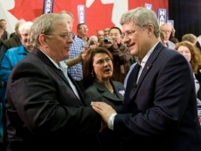 Prime Minister Stephen Harper shakes hands with supporters following a campaign rally in Stratford, PEI Sunday May 1, 2011. (THE CANADIAN PRESS/Adrian Wyld)