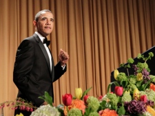 President Barack Obama pumps his fist as he walks to the rostrum during the White House Correspondents� Association Dinner in Washington, Saturday, April 30, 2011. (AP Photo/Manuel Balce Ceneta) 