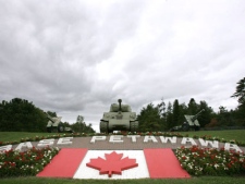 Grey skies loom over the main gate at Canadian Forces Base Petawawa, Ont. Monday, Sept. 4, 2006. About 450 troops from Canadian Forces Base Petawawa sought mental health counselling within a 10-month stretch last year, say internal military records. (THE CANADIAN PRESS/Jonathan Hayward)