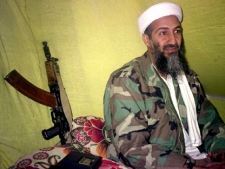 In this Dec. 24, 1998 file photo, al Qaida leader Osama bin Laden speaks to a selected group of reporters in mountains of Helmand province in southern Afghanistan. (AP Photo/Rahimullah Yousafzai)