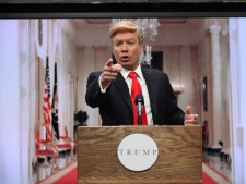 In this publicity image released by NBC, Jimmy Fallon, host of "Late Night with Jimmy Fallon," portrays Donald Trump during a public address about the demise of al-Qaida leader Osama Bin Laden, during a taping of "Late Night with Jimmy Fallon," airing Tuesday, May 3, 2011 at 12:35 a.m. on NBC. (AP Photo/NBC, Lloyd Bishop)