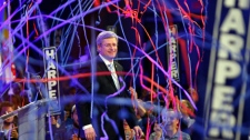 Prime Minister Stephen Harper, waves to party faithful after winning his first majority in Calgary, Alta., Monday, May 2, 2011. THE CANADIAN PRESS/Jeff McIntosh