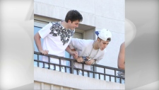 Justin Bieber caught spitting over hotel balcony