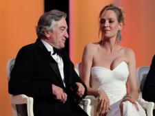 President of the jury Robert De Niro, left, and jury member Uma Thurman look on during the opening ceremony of the 64th international film festival, in Cannes, southern France, Wednesday, May 11, 2011. (AP Photo/Joel Ryan)