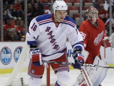 This Sept. 26, 2010, file photo shows New York Rangers winger Sean Avery during the second period of an NHL hockey game against the Detroit Red Wings, in Detroit. Avery's support for same-sex marriage has drawn fire from hockey agent Todd Reynolds and Rogers Sportsnet on-air host Damian Goddard. Goddard has been fired following several tweets supporting controversial remarks by Reynolds. (AP Photo/Carlos Osorio, File)