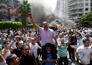 Egyptian security forces clear sit-in camp Cairo