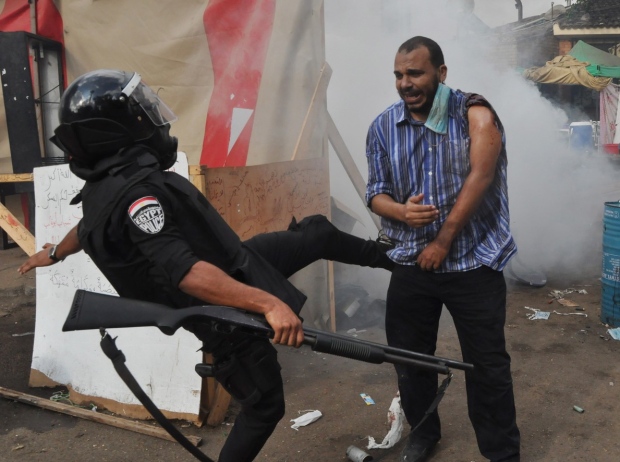 Egyptian security forces raid sit-ins