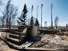 All that remains of a house in Slave Lake, Alberta, on Monday, May 16, 2011 is a set of steps. Whole neighbourhoods were flattened by a devastating wildfirethat swept through the town of 7,000 destroying upwards of 40% of the buildings. THE CANADIAN PRESS/Ian Jackson