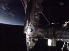 A photo made from NASA video shows the Endeavour docked on the Harmony node of the International Space Station, Wednesday May 18, 2011, on the penultimate voyage of the space shuttle program. It is carrying a particle physics detector for the station. (AP Photo/NASA)