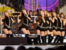 South Korean pop group Girls' Generation perform in nationwide Grand Chorus Celebration as part of efforts to let the world know about how passionately Koreans want to host the 2018 Winter Olympics at Seoul Plaza in Seoul, South Korea, Saturday, May 14, 2011. Pyeongchang is up against Munich of Germany and Annecy of France to host the 2018 Winter Olympics hosted by the International Olympic Committee. This is its third straight bid for a Winter Games, after losing previous bidding races. (AP Photo/Ahn Young-joon)