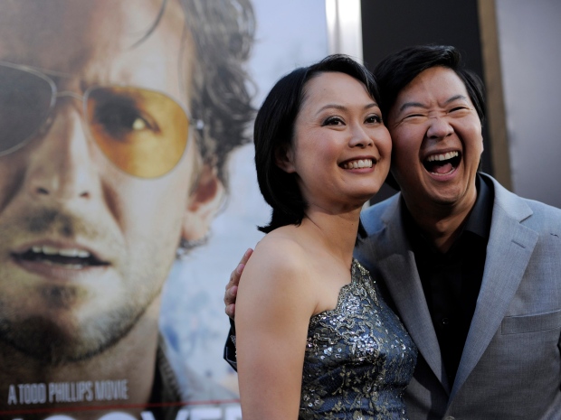 Ken Jeong, a cast member in "The Hangover Part II," poses with his wife Tran at the premiere of the film, Thursday, May 19, 2011, in Los Angeles. (AP Photo/Chris Pizzello)