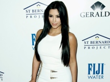 Kim Kardashian arrives at an Evening of "Southern Style" presented by The St. Bernard Project and the Spears Family in Beverly Hills, Calif., Wednesday, May 11, 2011. The St. Bernard Project is a non-profit organization that provides relief work for survivors of Hurricane Katrina. (AP Photo/Matt Sayles)