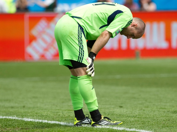 Toronto FC's goalkeeper Stefan Frei reacts after Phildelphia Union's Danny Mwanga scores his team's sixth goal during second half MLS action in Toronto on Saturday May 28, 2011. (THE CANADIAN PRESS/Chris Young)