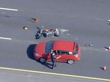 Emergency personnale at the scene of a fatal crash in the westbound lanes of Highway 401 at Stevenson Road on Wednesday, June 1, 2011. 