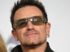 Singer Bono of the rock band U2 poses in the press room at the 2011 Billboard Music Awards in Las Vegas on Sunday, May 22, 2011. (AP Photo/Dan Steinberg)