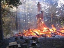 A cottage on Haliburton Lake belonging to former Ontario finance minister Greg Sorbara was destroyed by fire, as shown in this handout photo, Thursday morning June 2, 2011. Sorbara said he and his wife, Kate, bought the property in 1982 and the current cottage was built about 10 years later. (THE CANADIAN PRESS/HO-Fire Department Municipality of Dysart)