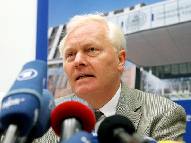 Reinhard Burger, head of the Robert Koch Institute speaks during a news conference after visiting E. coli patients at the University Clinic Hamburg-Eppendorf in Hamburg, northern Germany, Sunday, June 5, 2011. Burger says in addition to the 21 people killed in Germany and one in Sweden, another 2,153 have been sickened, including 627 people who have developed a rare complication that can cause kidney failure. (AP Photo/dapd, Focke Strangmann)