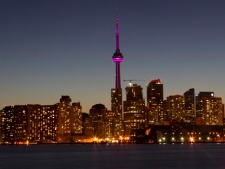 The Toronto city skyline is pictured moments before the start of Earth Hour on Saturday March 26, 2011. Buildings and homes across the country are going dark as Canadians take part in the fifth annual Earth Hour. THE CANADIAN PRESS/Chris Young