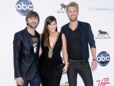 From left to right, Dave Haywood, Hillary Scott, and Charles Kelley of the band Lady Antebellum arrive at the 2011 Billboard Music Awards in Las Vegas on Sunday, May 22, 2011. (AP Photo/Dan Steinberg)