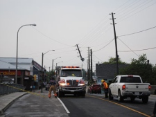 Crews work to restore power on Hwy. 35 in the town of Coboconk, Ont. after a severe storm on Wednesday, June 8, 2011. (Mathew Winch, special to CP24)