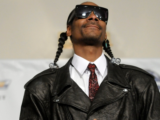 Rapper Snoop Dogg poses in the press room at the 2011 Billboard Music Awards in Las Vegas on Sunday, May 22, 2011. (AP Photo/Dan Steinberg)